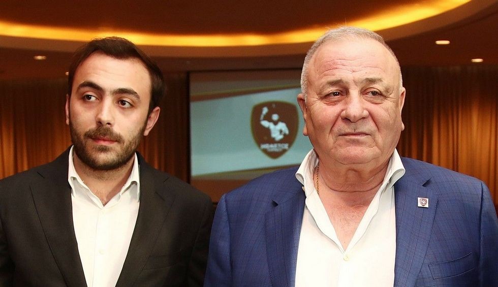 A generic square placeholder image with rounded corners in a figure.