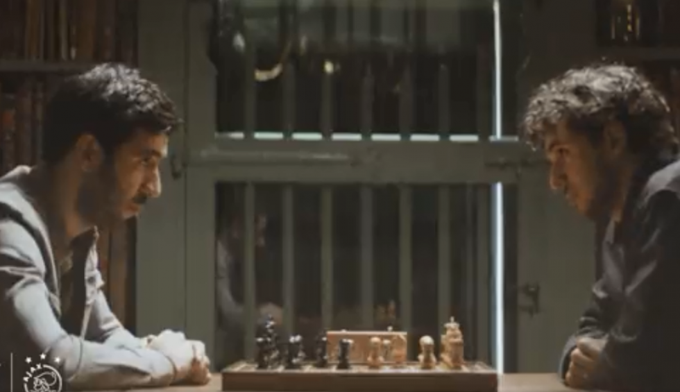 A generic square placeholder image with rounded corners in a figure.