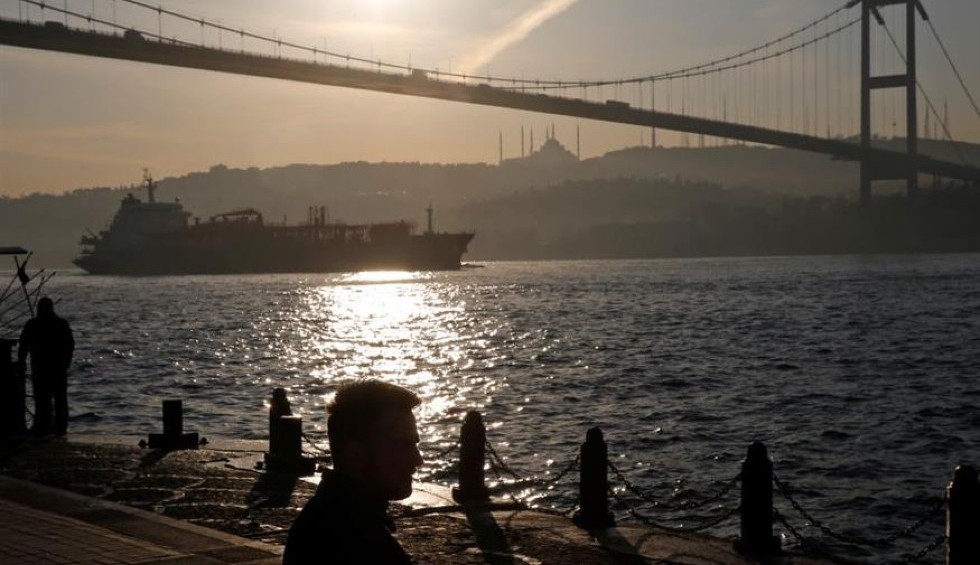 A generic square placeholder image with rounded corners in a figure.