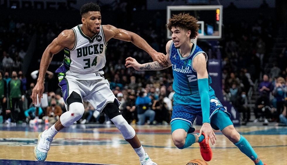 A generic square placeholder image with rounded corners in a figure.