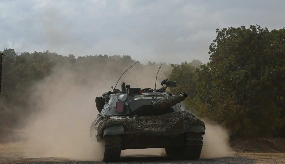 A generic square placeholder image with rounded corners in a figure.