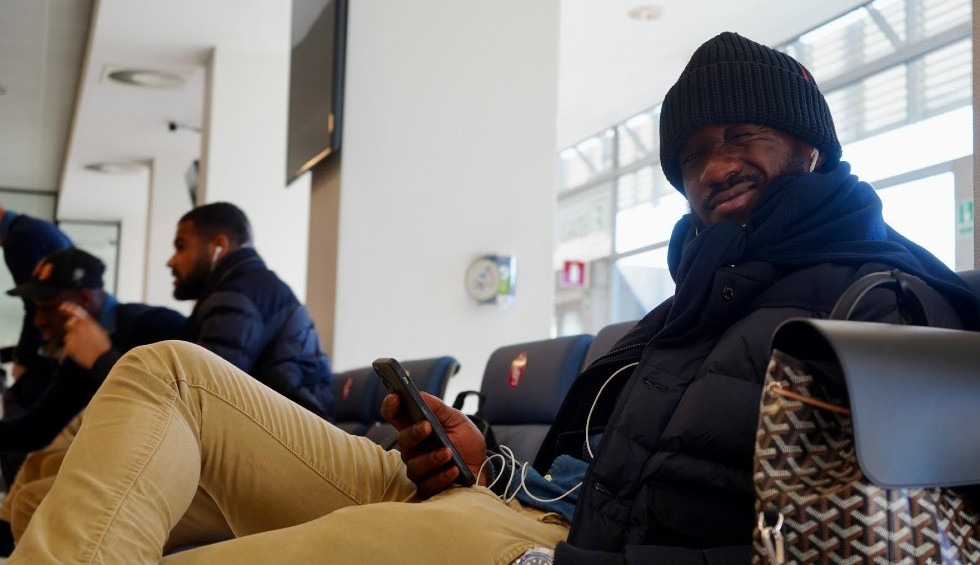 A generic square placeholder image with rounded corners in a figure.