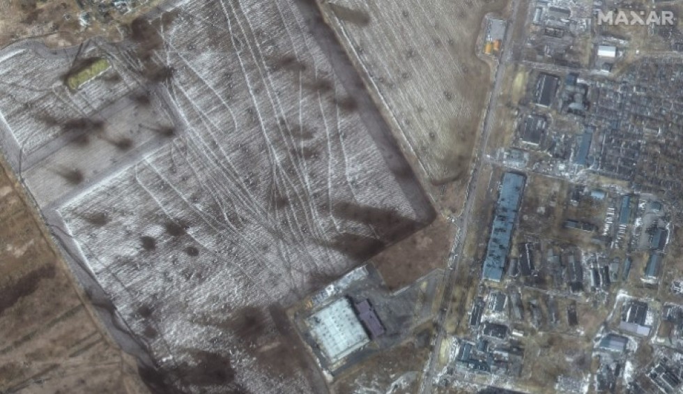 A generic square placeholder image with rounded corners in a figure.