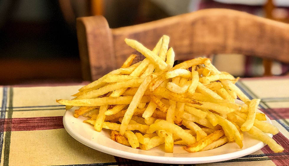 A generic square placeholder image with rounded corners in a figure.