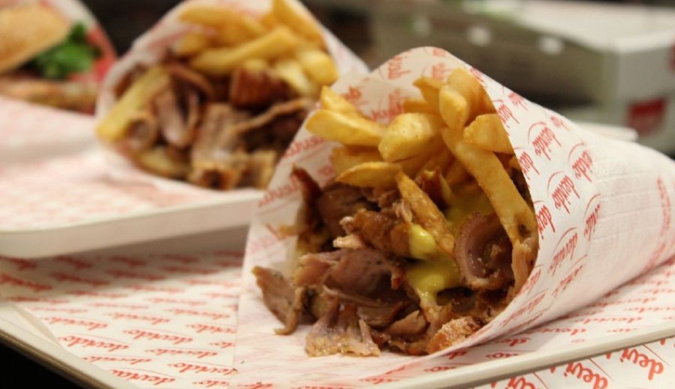 A generic square placeholder image with rounded corners in a figure.