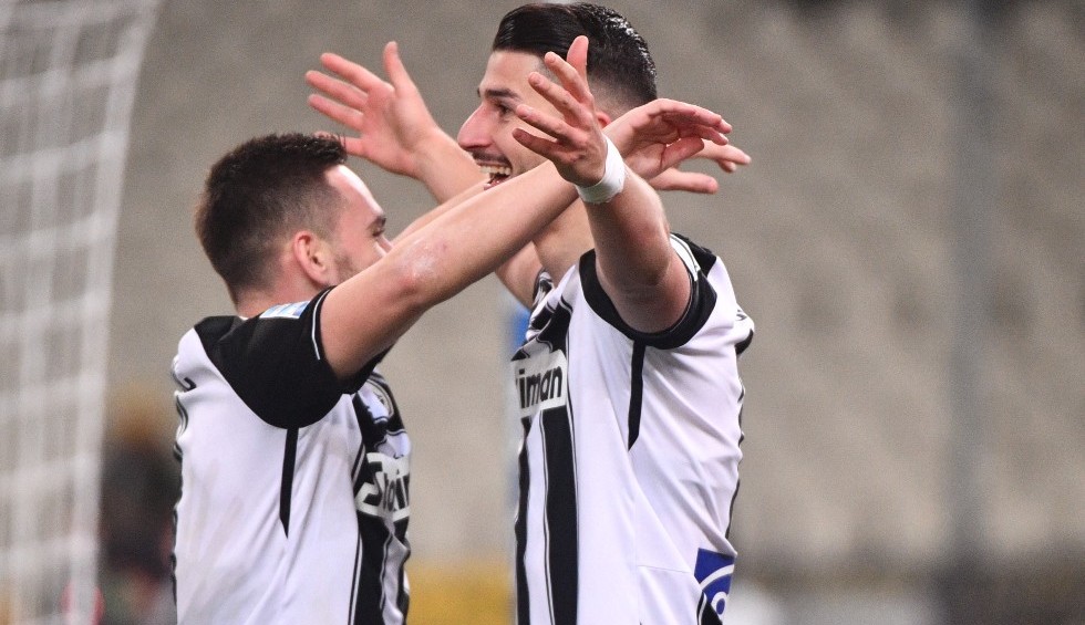 A generic square placeholder image with rounded corners in a figure.