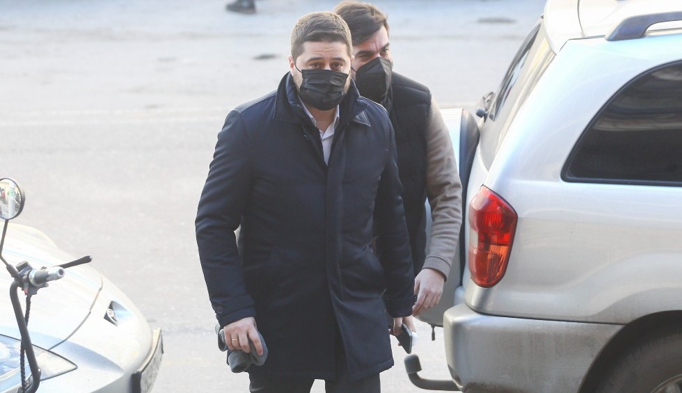 A generic square placeholder image with rounded corners in a figure.