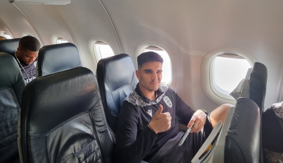 A generic square placeholder image with rounded corners in a figure.