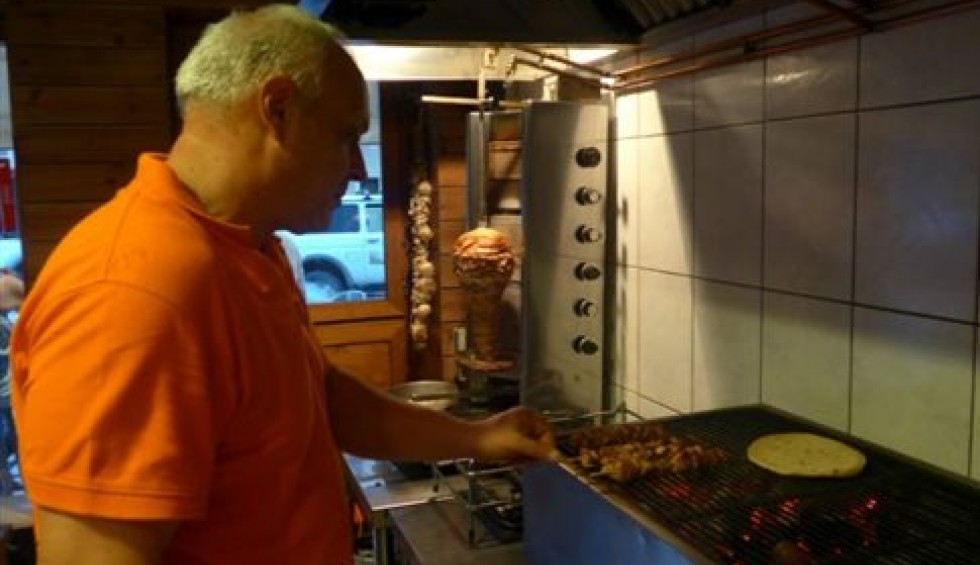 A generic square placeholder image with rounded corners in a figure.