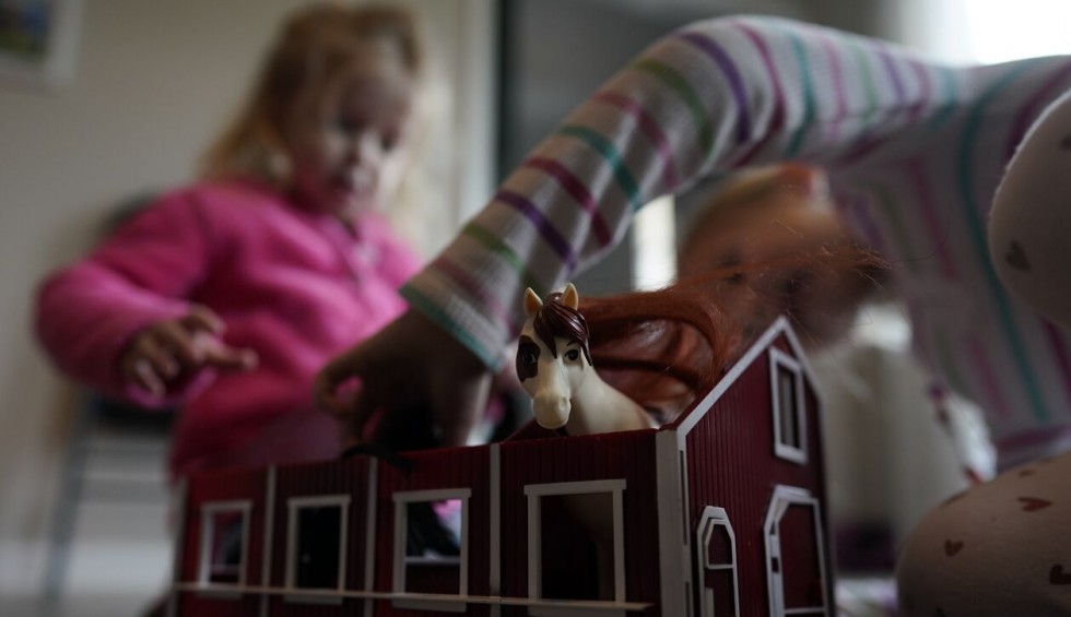 A generic square placeholder image with rounded corners in a figure.