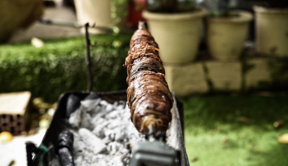 A generic square placeholder image with rounded corners in a figure.