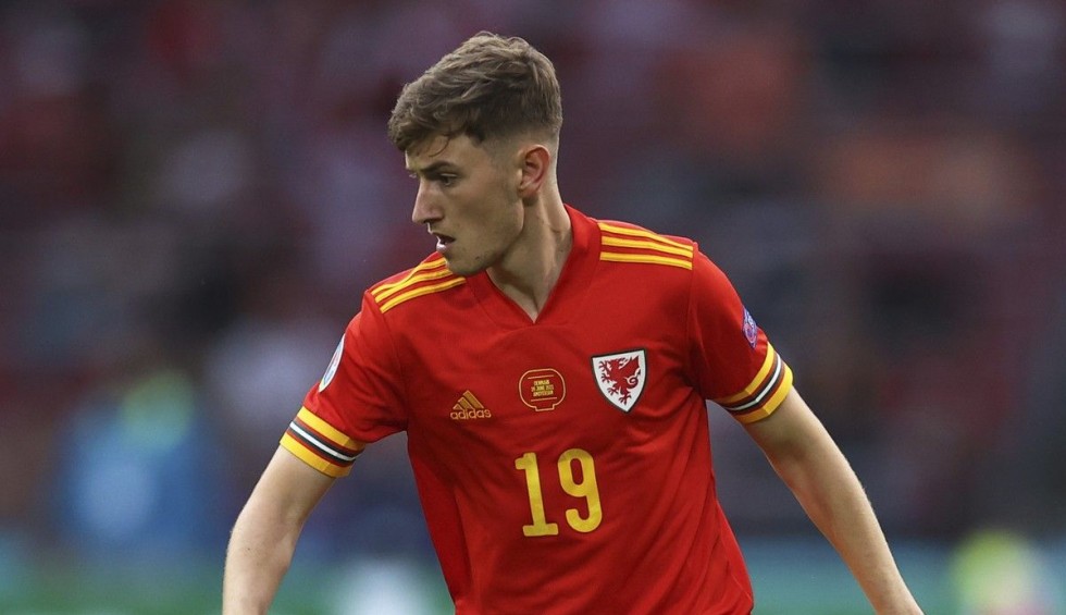 A generic square placeholder image with rounded corners in a figure.