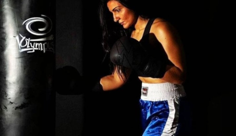 A generic square placeholder image with rounded corners in a figure.