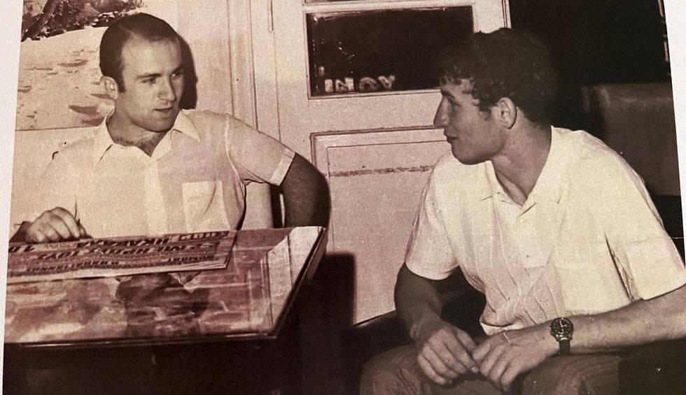 A generic square placeholder image with rounded corners in a figure.