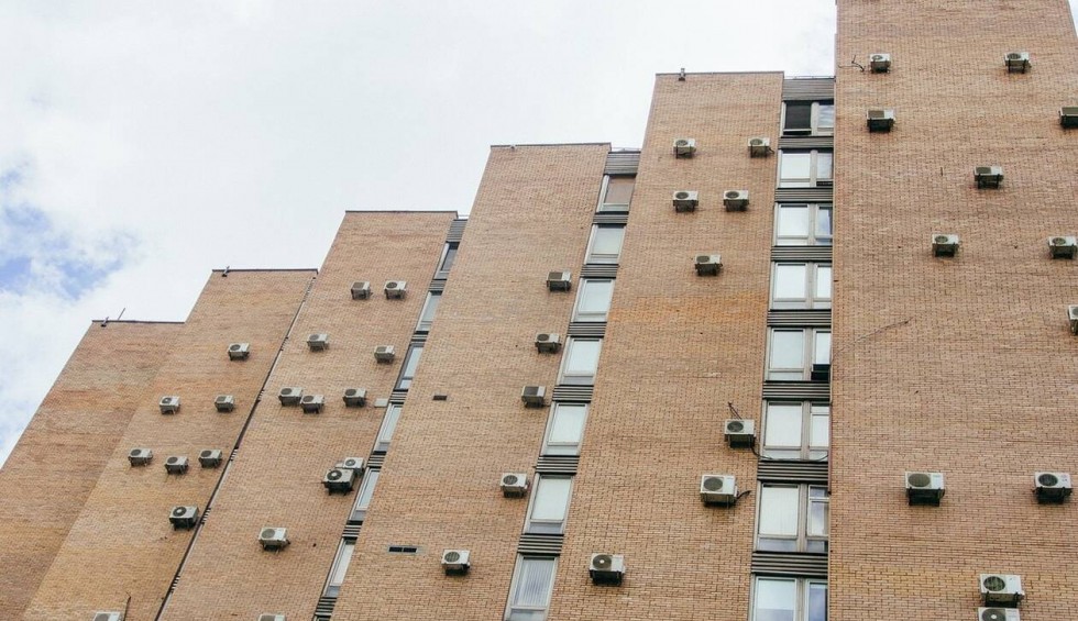 A generic square placeholder image with rounded corners in a figure.