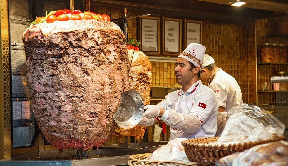 A generic square placeholder image with rounded corners in a figure.