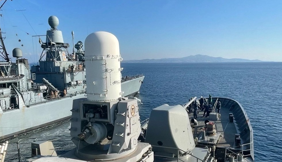 A generic square placeholder image with rounded corners in a figure.