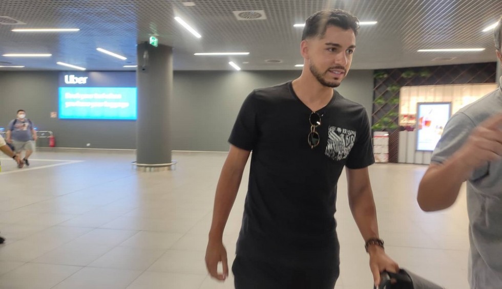 A generic square placeholder image with rounded corners in a figure.