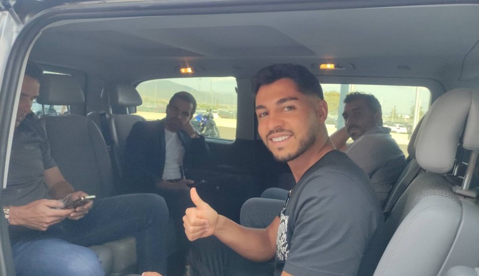 A generic square placeholder image with rounded corners in a figure.