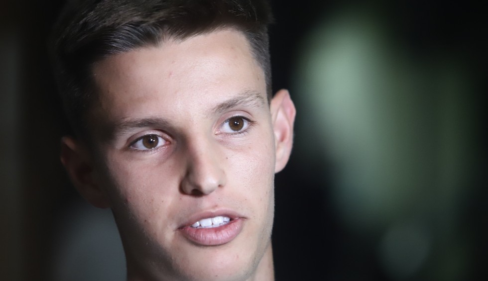 A generic square placeholder image with rounded corners in a figure.