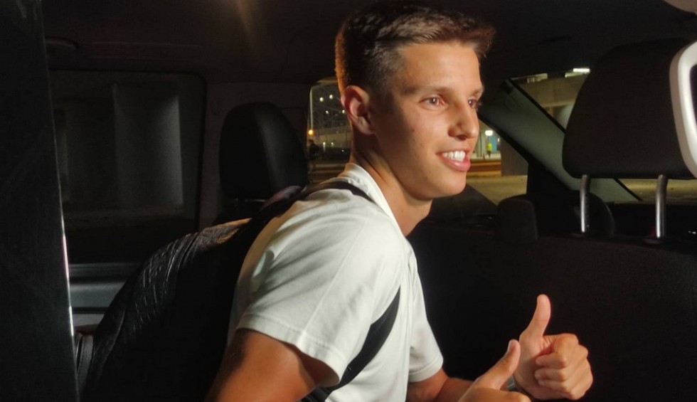 A generic square placeholder image with rounded corners in a figure.