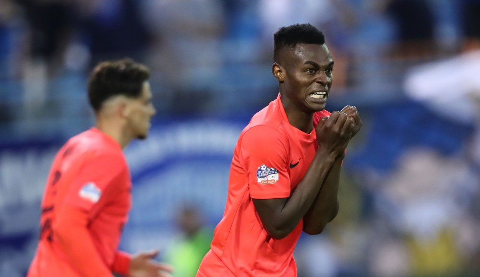 A generic square placeholder image with rounded corners in a figure.