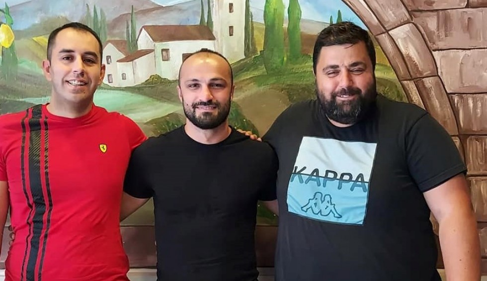 A generic square placeholder image with rounded corners in a figure.