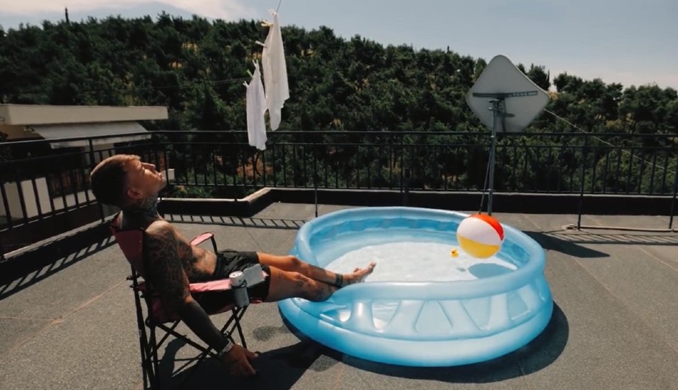 A generic square placeholder image with rounded corners in a figure.