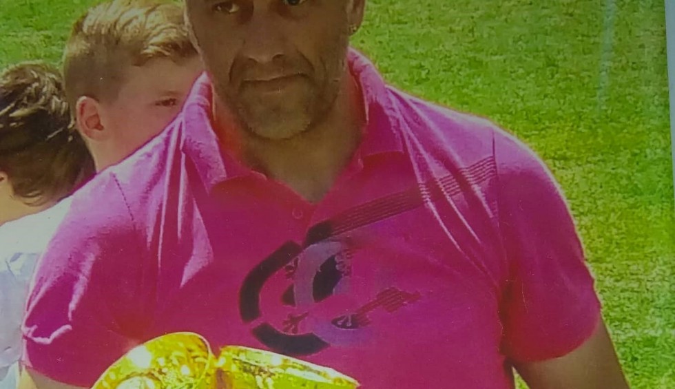 A generic square placeholder image with rounded corners in a figure.