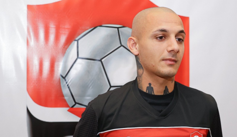 A generic square placeholder image with rounded corners in a figure.