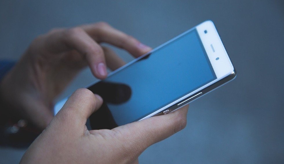 A generic square placeholder image with rounded corners in a figure.