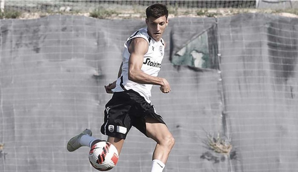 A generic square placeholder image with rounded corners in a figure.