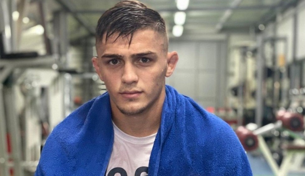 A generic square placeholder image with rounded corners in a figure.