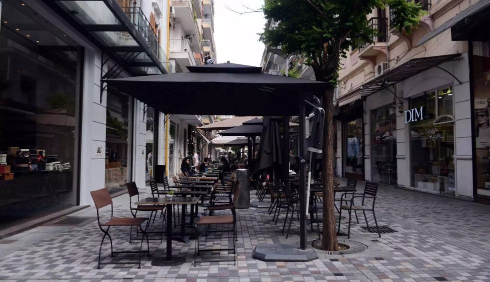 A generic square placeholder image with rounded corners in a figure.