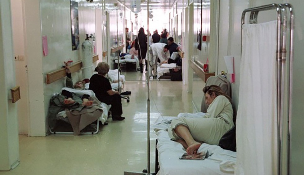 A generic square placeholder image with rounded corners in a figure.