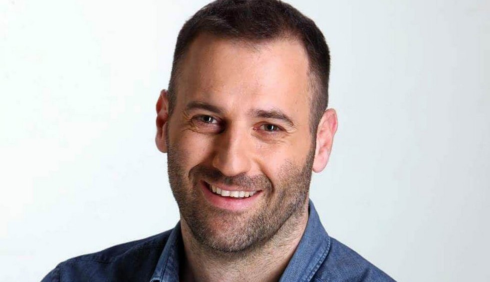 A generic square placeholder image with rounded corners in a figure.