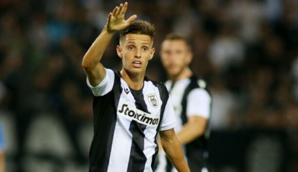 A generic square placeholder image with rounded corners in a figure.