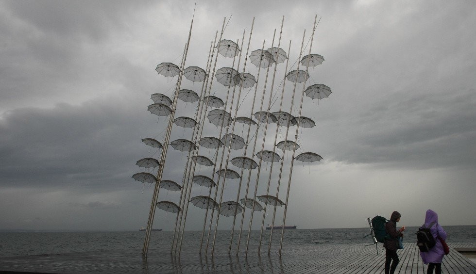 A generic square placeholder image with rounded corners in a figure.