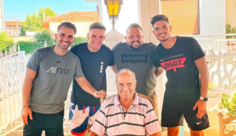 A generic square placeholder image with rounded corners in a figure.