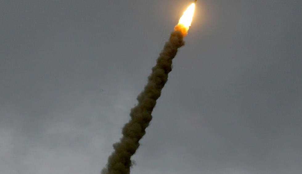 A generic square placeholder image with rounded corners in a figure.