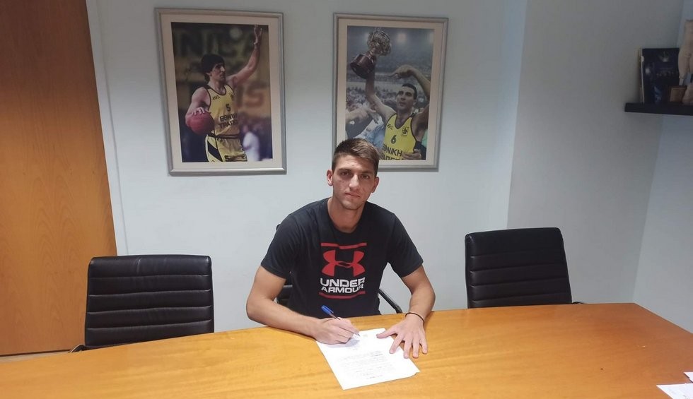 A generic square placeholder image with rounded corners in a figure.