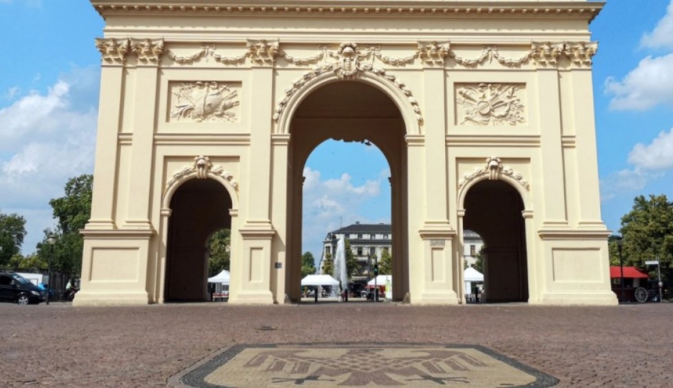 A generic square placeholder image with rounded corners in a figure.