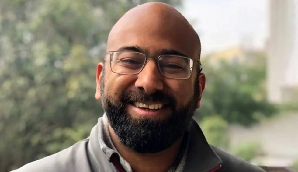 A generic square placeholder image with rounded corners in a figure.