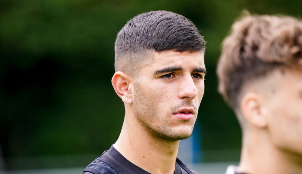 A generic square placeholder image with rounded corners in a figure.