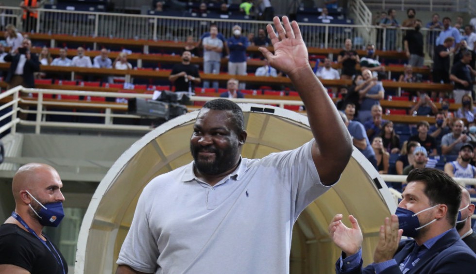 A generic square placeholder image with rounded corners in a figure.