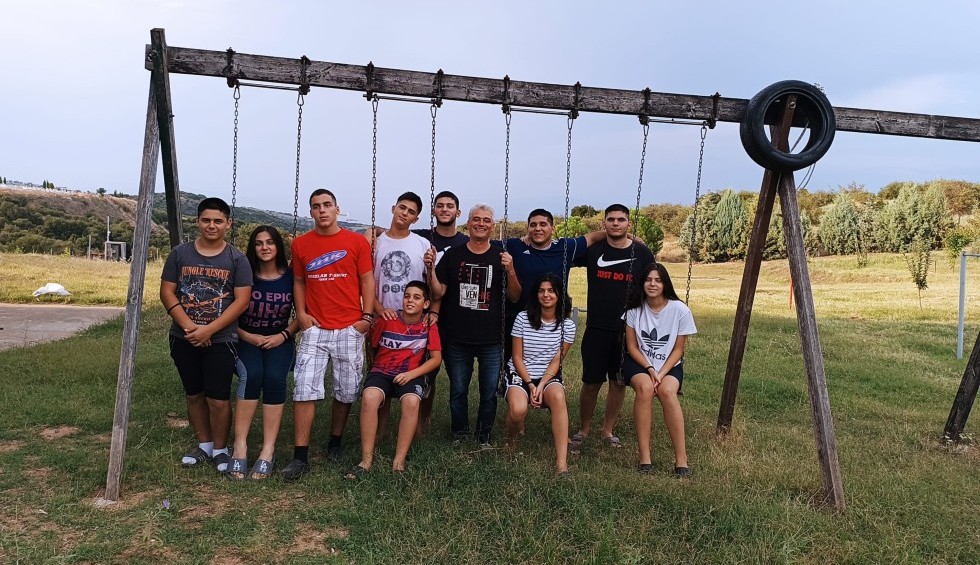 A generic square placeholder image with rounded corners in a figure.