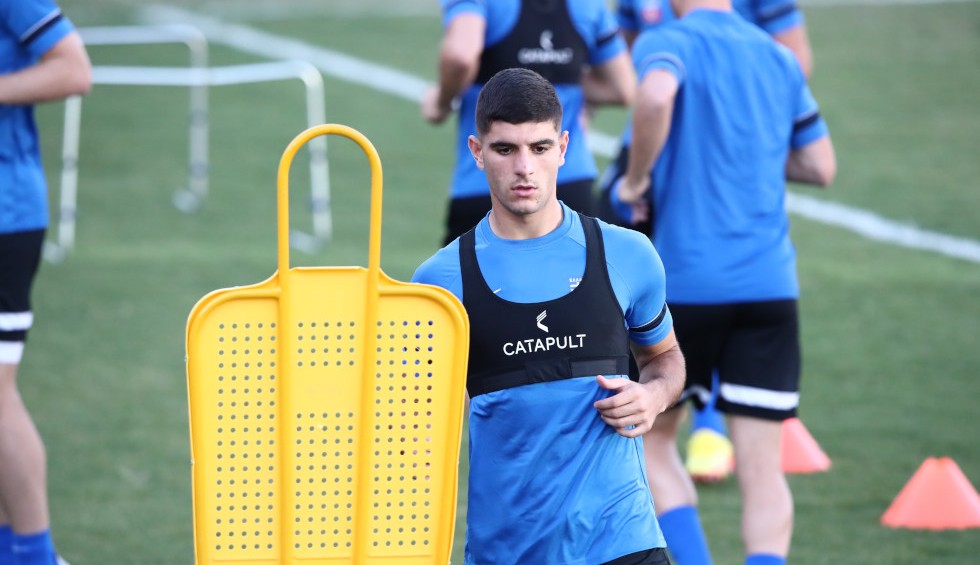 A generic square placeholder image with rounded corners in a figure.