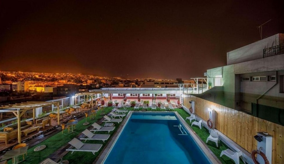 A generic square placeholder image with rounded corners in a figure.