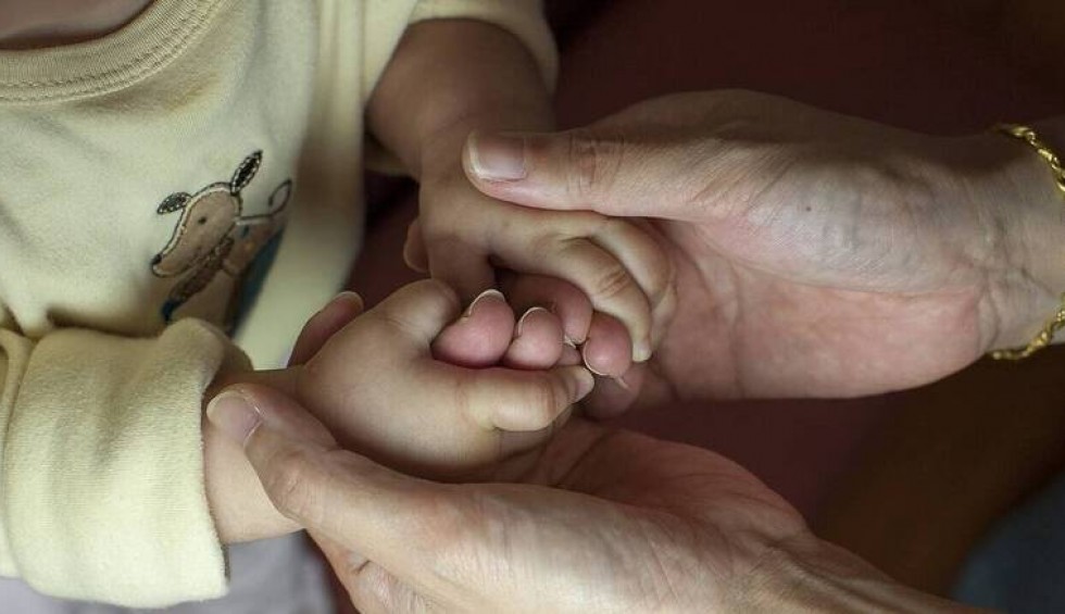 A generic square placeholder image with rounded corners in a figure.