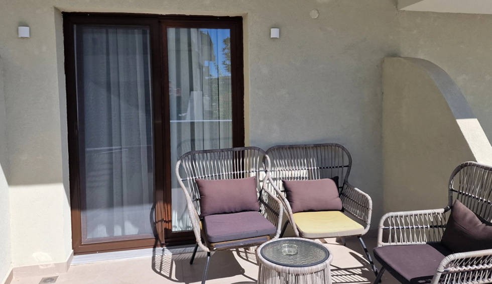 A generic square placeholder image with rounded corners in a figure.